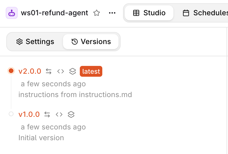 The Versions tab of the agent: v2.0.0 latest, "instructions from instructions.md", above v1.0.0, "Initial version".